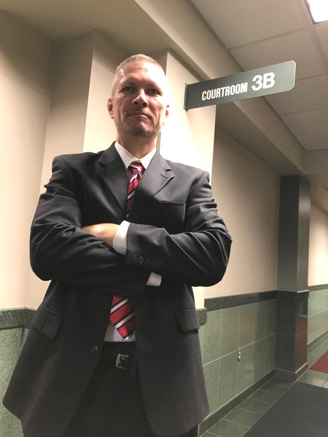 L. Martin Taylor standing outside Courtroom 3B at the Gaston County Courthouse